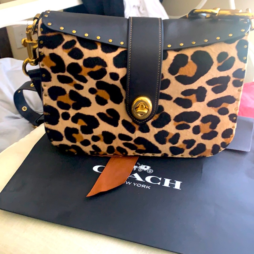 COACH PAGE 27 WITH LEOPARD PRINT